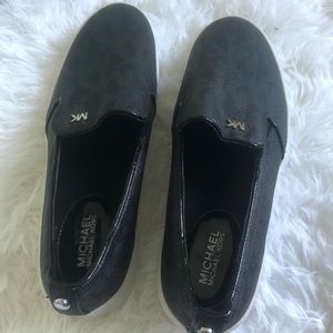 Michael Kors black leather slip on sneakers